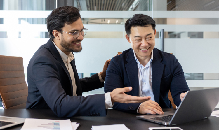 Two business men working together accounting